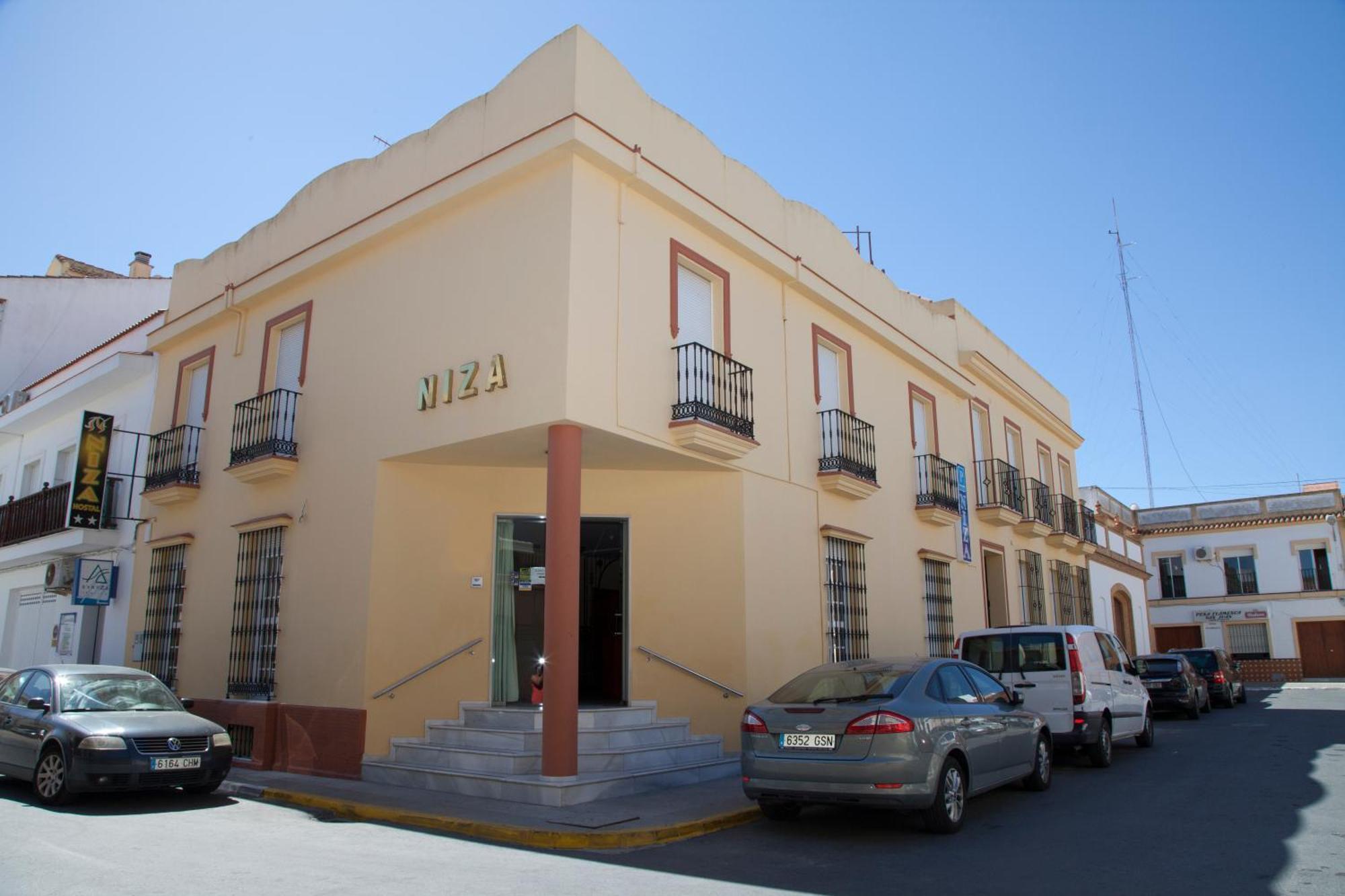 Hostal Niza San Juan Del Puerto Exterior photo